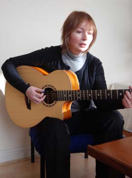 Mary Hopkin playing guitar in Space Studios' reception